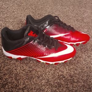 Black, white, and red Nike cleats